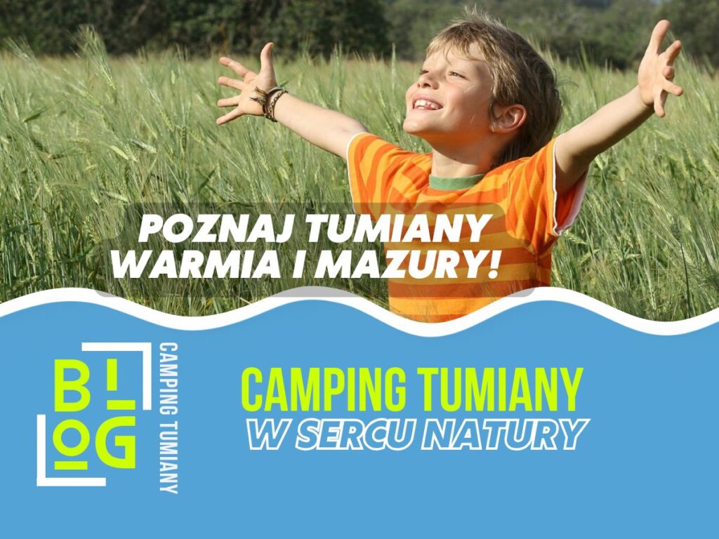 Chłopiec cieszy się słonecznym dniem, symbolizującym wakacje nad jeziorem.