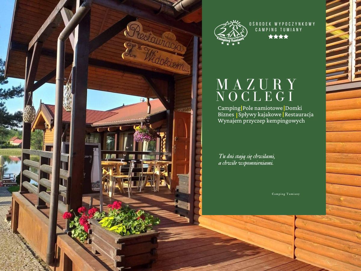 zielony-restauracja-warmia.jpg Drewniana weranda z kwiatami prowadzi do restauracji Warmia w ośrodku wypoczynkowym.