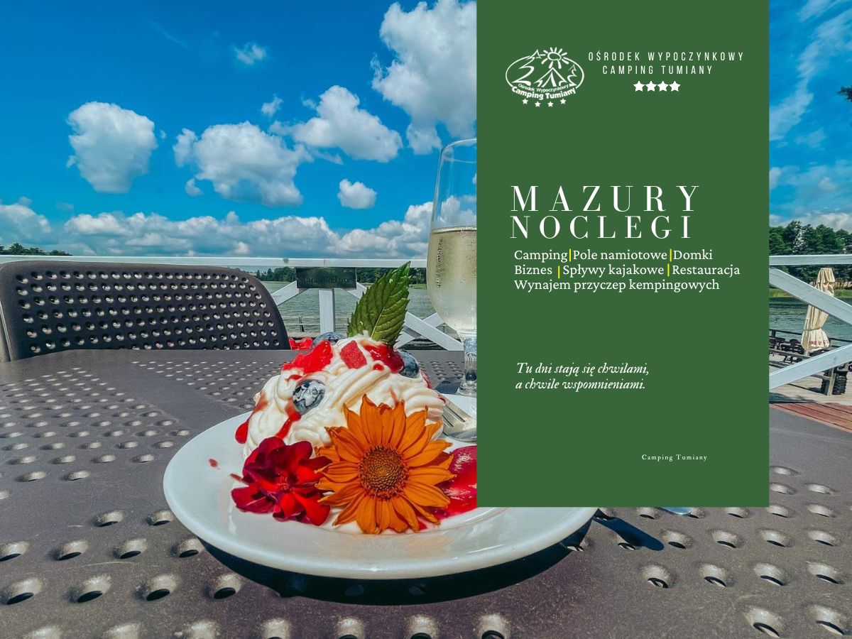 Deser na stole z widokiem na jezioro w restauracji Olsztyn.